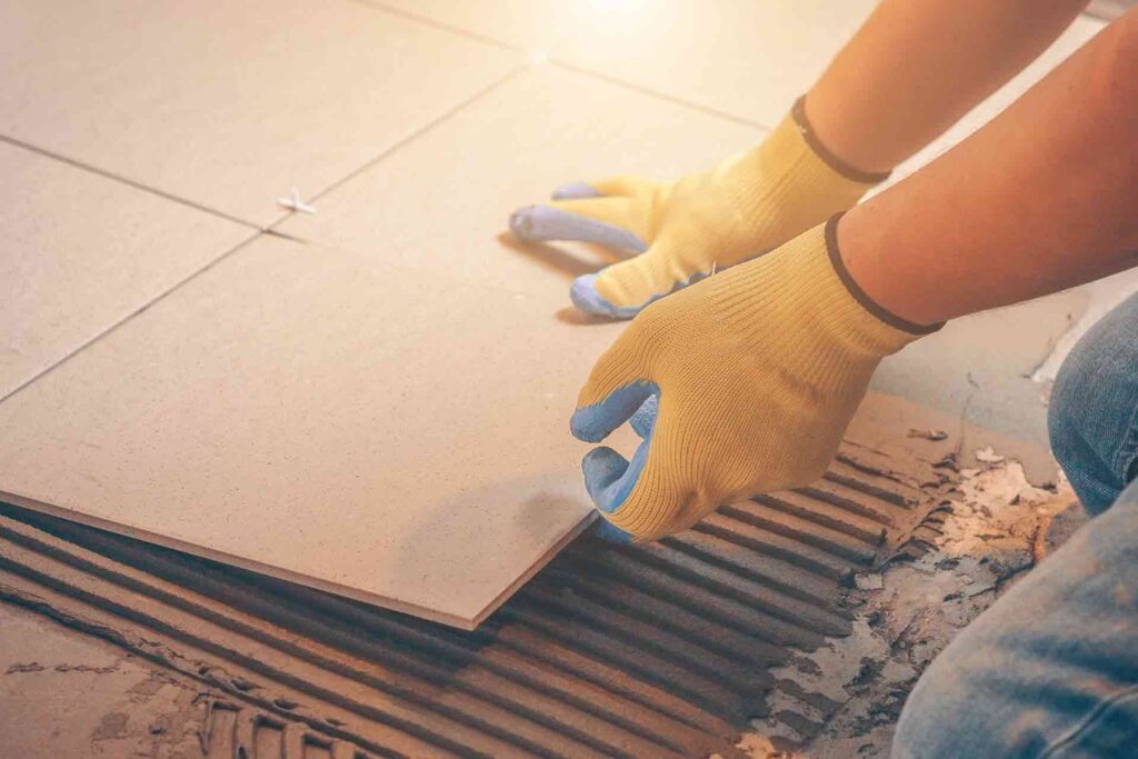 Porcelain tiles being installed by a professional tiler